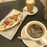 Almond ricotta with roast tomato, cortado with oat milk & americano  at Pantastic in Ibiza