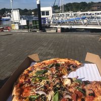 I’d recommend getting it to takeout and eat by the harbour  at eatPIZZA in Lymington