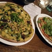 pesto pizza and rocket garlic pizza at Mandala & Co in Mermaid Beach