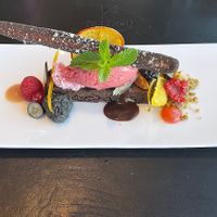 dessert: chocolate brownie, sorbet, berrys, pistachios, peanut, blood orange  at Falcon Marktrestaurant in Soelden