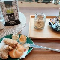 Three mini bread rolls and two savoury spreads (as well as a Tea) are considered a big breakfast. at Green Taste in Innsbruck