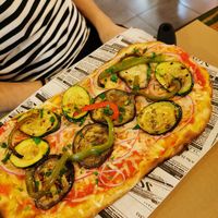 Vegetarian pizza made vegan with some vegan cheese at KISA'  in Lagos