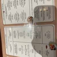 partial menu in English, complete with phone shadow  at Le Casse-Crêpe Breton in Quebec