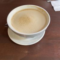 Bowl of cafe au lait with oat milk  at Le Casse-Crêpe Breton in Quebec