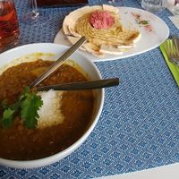Lentils with curry and vegetables, and hummus. at Meu Limao in Lagos