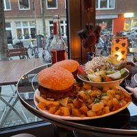 Vegan Boheme and Californication Burgers with potatoes and salad  at Hotel Galactica in Muenster