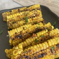 Complimentary marinated sweet corn!  at Sauce Tree Kuta in Kuta