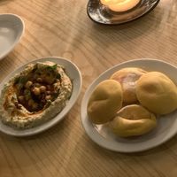 Pistachio Hummus with chilli oil and fresh mini pitta  at Evelyn's in Manchester