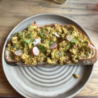 The avocado toast was served on thick sourdough.  at Evelyn's in Manchester