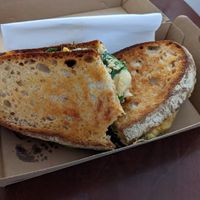 Mushroom and jalapenos toast (takeaway version) at Romesco Cafe in Wembley