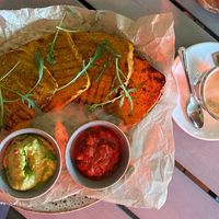 Vegan french toast with homemade guacamole and tomato pasta; cortado with rice drink at Törökméz in Budapest