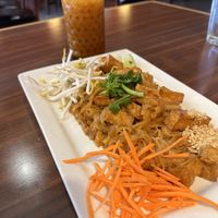 Vegan pad Thai with a vegan Thai iced teaa  at Bann Thai in Fort Collins