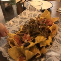 Nachos deluxe a 7 euros muy grandes!  at La Loncheria Bcn in Barcelona