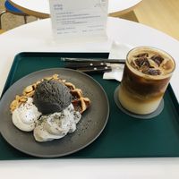 Waffle with Black Sesame Ice Cream, Whipped Cream & Iced Vanilla Latte 💚  at Nuldam Space - 널담은공간 경복궁점 in Seoul