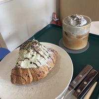 Matcha cream croissant, black sesame iced coffee  at Nuldam Space - 널담은공간 경복궁점 in Seoul