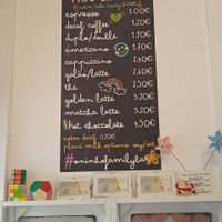 Price list at O Ninho Family Bar in Lagos