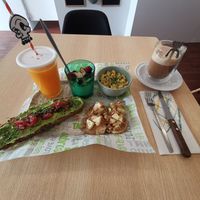 Vegan breakfast with an iced latte at O Ninho Family Bar in Lagos