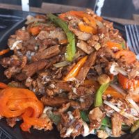 Huge mix meat dish with cheese and capsicum absolutely delicious and gluten free at V De Vegano  in Mexico City