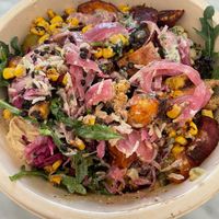 CAVA has delicious vegan options including grains, greens, roasted veggies, roasted sweet potatoes, falafel, black lentils, hummus, harissa, and much more. It’s YUM!  at CAVA in Fort Worth