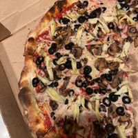 Amazing vegan pizza w/ vegan cheese, black olives, mushrooms and artichoke hearts    at Iggy's Pizza Shop in Mount Pleasant