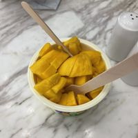 Mango ice cream with extra mango  at MyGovindas - JLT in Dubai
