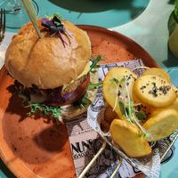 Korean juice burger with potatoes at Puravita Vegan  in Estepona