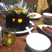 Example of playing and lotus tea. at Fu Hui Ci Yuan Vegetarian Restaurant in Beijing