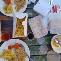 Fried rice, chips, sweet n sour chicken, dumplings and water chestnuts with tofu and bamboo shoots at Vegan House in Pudsey