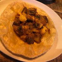 Garlic mushrooms on puri starter   at Cafe Spice in Newcastle Upon Tyne