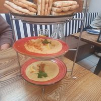 Cold meze (top to bottom): GREEK FLATBREAD, HOUMOUS, SANTORINI FAVA at The Real Greek in Manchester