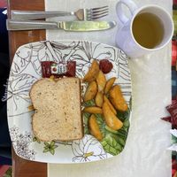 Vegetable and cheese sandwich and ginger tea  at La Tradición in Palenque