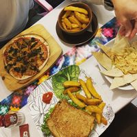 Vegan pizza, potato wedges, hummus & the vegan sandwich   at La Tradición in Palenque