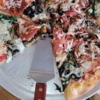 They don't have any mock meats, but portobello mushrooms and large tomatoes give the illusion at Antonio's House of Pizza in Kissimmee