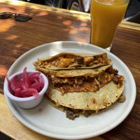 Quesadillas de los tres guisos de tacos secos y agua de mango.  at Hierba Santa in Tuxtla Gutierrez