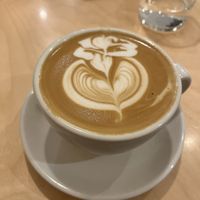 Flat white with oat milk  at Ten Square Cafe in Melbourne