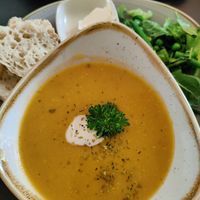 Myskikurpitsakeitto/ pumpkin soup freshly baked bun at Kahvila Rakastan in Helsinki