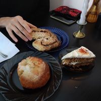 In the back cinnamon roll, on the right carrot cake and in the front the 'butter' bun at Kahvila Rakastan in Helsinki