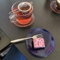 Tea, raspberry-liquorice square  at Kahvila Rakastan in Helsinki