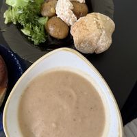 Buffet of roasted cauliflower soup, slow cooked potatoes and a cinnamon bun for dessert    at Kahvila Rakastan in Helsinki