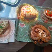 Pie with egg-butter, bun with rhubarb and strawberry, cinnamon bun, pie with vegan caviar at Kahvila Rakastan in Helsinki