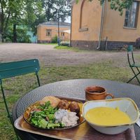 Cozy outdoor seating at Kahvila Rakastan in Helsinki