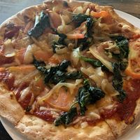 Personal pizza, vegan cheese, roasted onions/tomatoes/spinach  at Coal Fire  in Gaithersburg