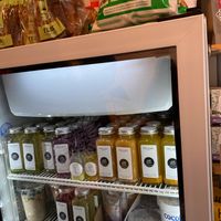 Drink fridge with Cocojune yogurt and other stuff  at Little Rico in Hudson