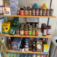 Shelf of food stuff for sale at Little Rico in Hudson