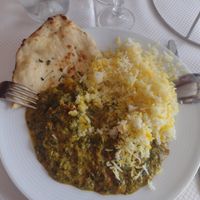 €13 curry and rice, whole garlic naan €3.50 at Le Maharaja in Dijon