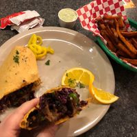 Spicy beef strips wrap with sweet potato fries at Green Vegetarian Cuisine at Alon in San Antonio