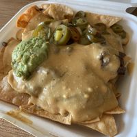 Deluxe nachos. Solid. Bold flavors but too salty   at Green Vegetarian Cuisine at Alon in San Antonio