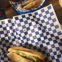 Brats with dill relish and sweet and sour mustard. at Munchen Haus in Leavenworth