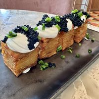 1,000 Layer Crispy Potatoes, “caviar”, “sour cream”, and chives   at Planta Queen - Fort Lauderdale in Fort Lauderdale