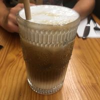 Iced oat latte  at Mercador Café in Porto